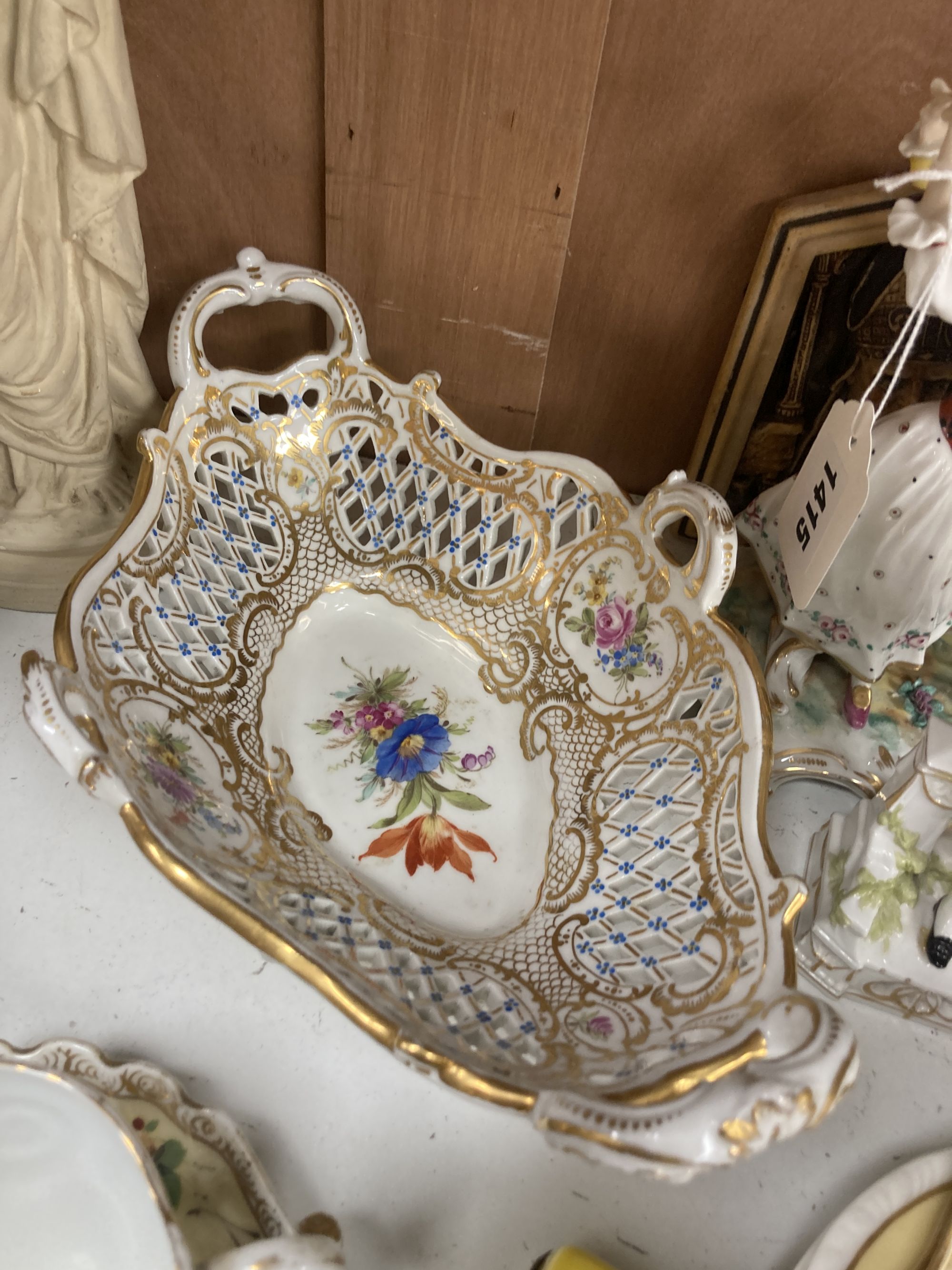 A collection of figurines, cabinet cups plates, two boxes, etc.